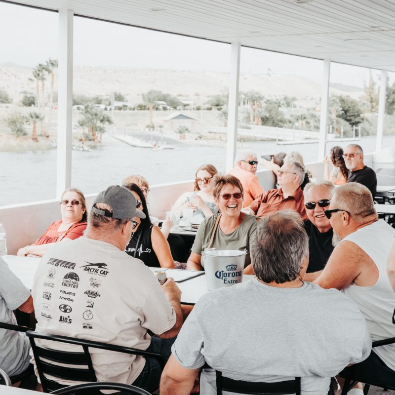 a group of people sitting at a table