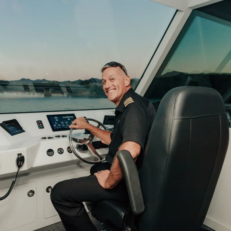 a man and a woman taking a selfie in a car