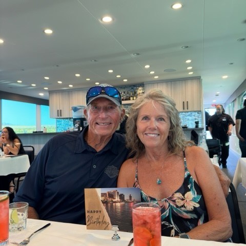 a group of people sitting at a table