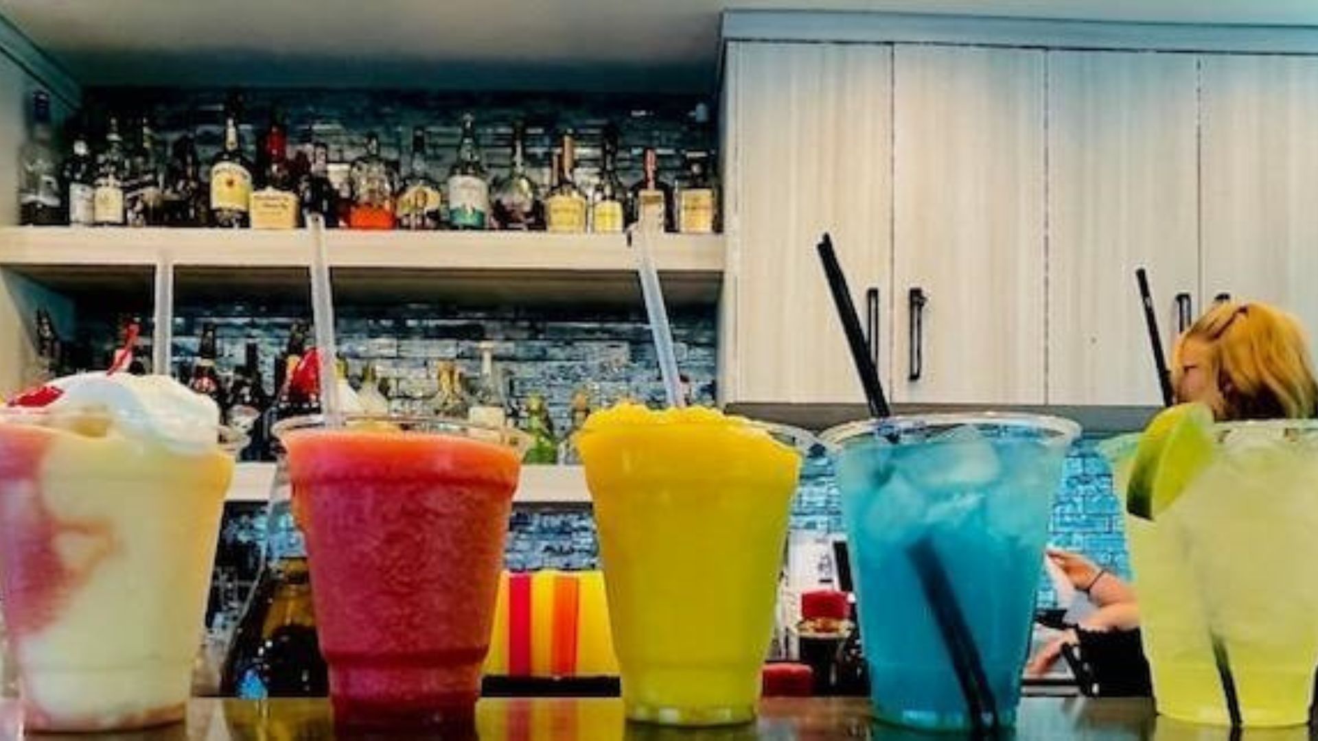 Four Tips for an Unforgettable Celebration on Your Private Cocktail Cruise (1) five cold drinks lined up on counter