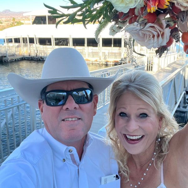 a couple of people posing for the camera