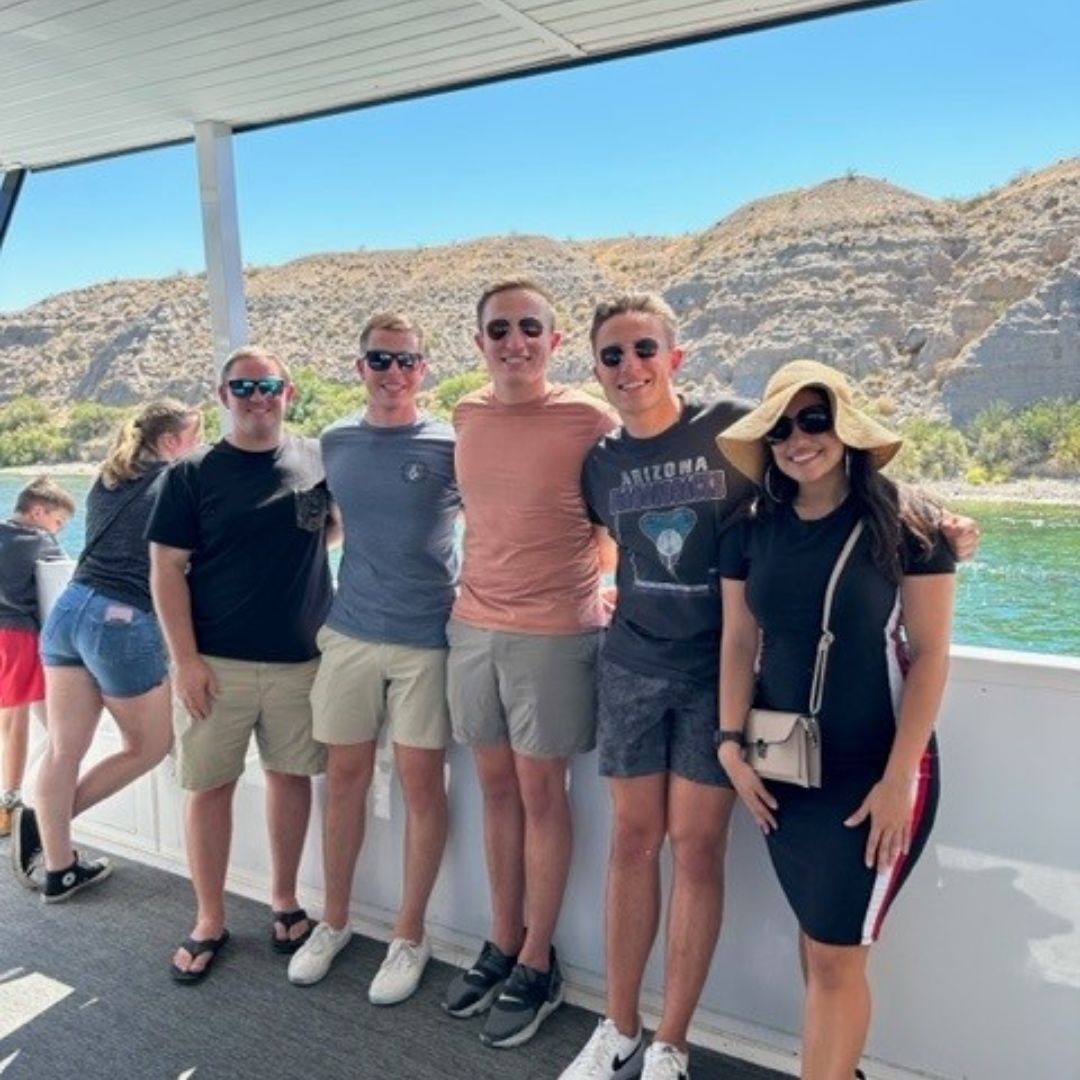 family smiling on the boat