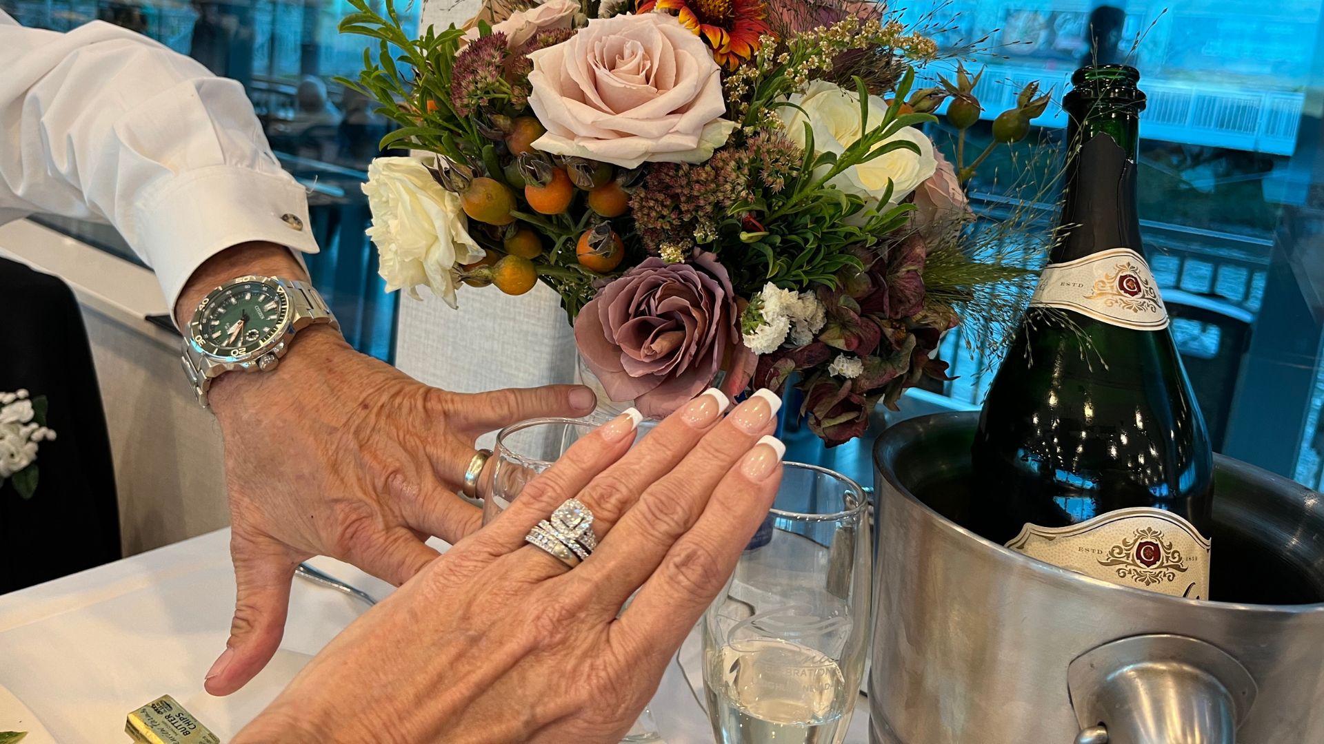 M45707-HERO-Creating Unforgettable Memories Grand Wedding Celebrations With Laughlin River Tours a person holding a flower