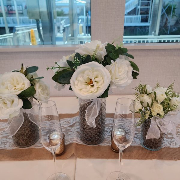 a vase of flowers on a table