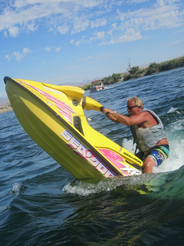 a person riding a surf board on a body of water