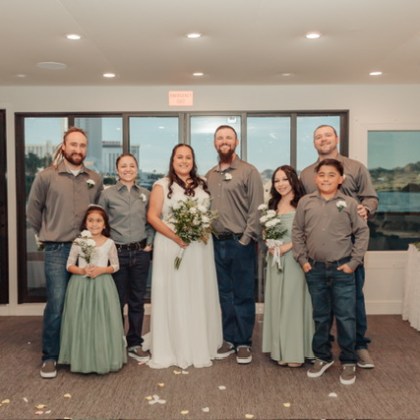 a group of people standing in a room
