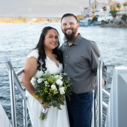 a person standing in front of a boat